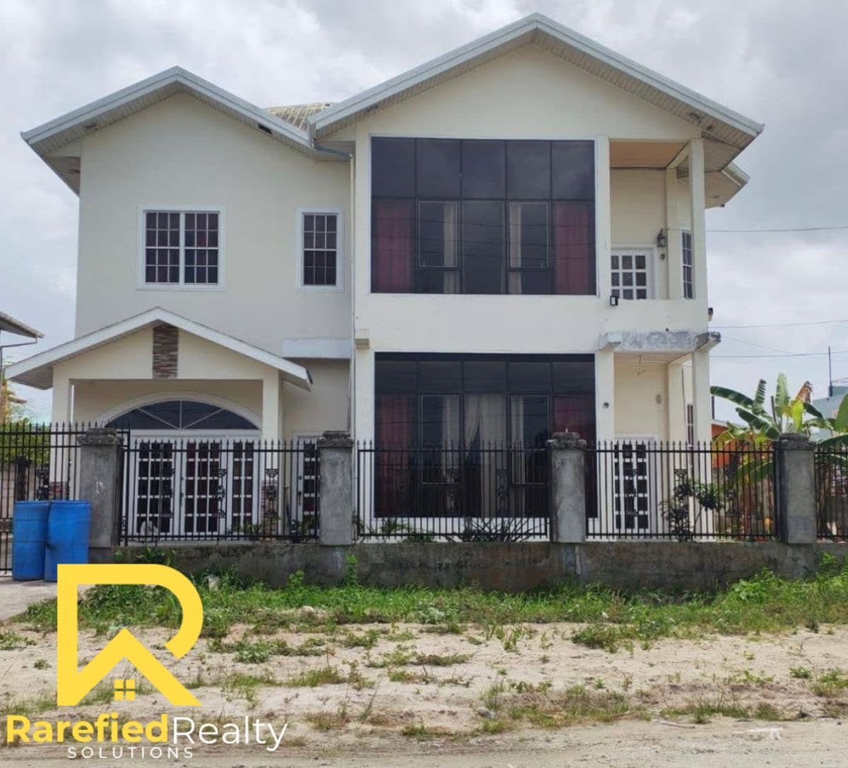 Stunning 5-Bedroom, Two-Storey Home with Roof Deck